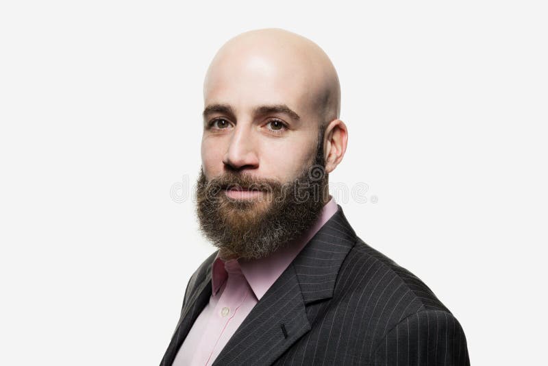 Young bald man with a beard stock photos