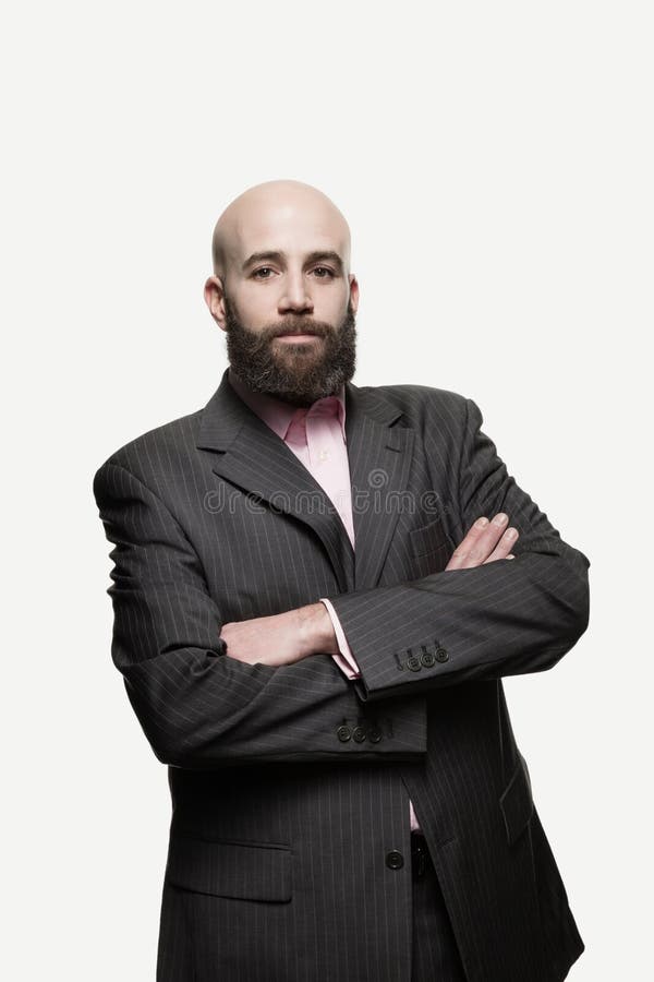 Young bald man with a beard stock images