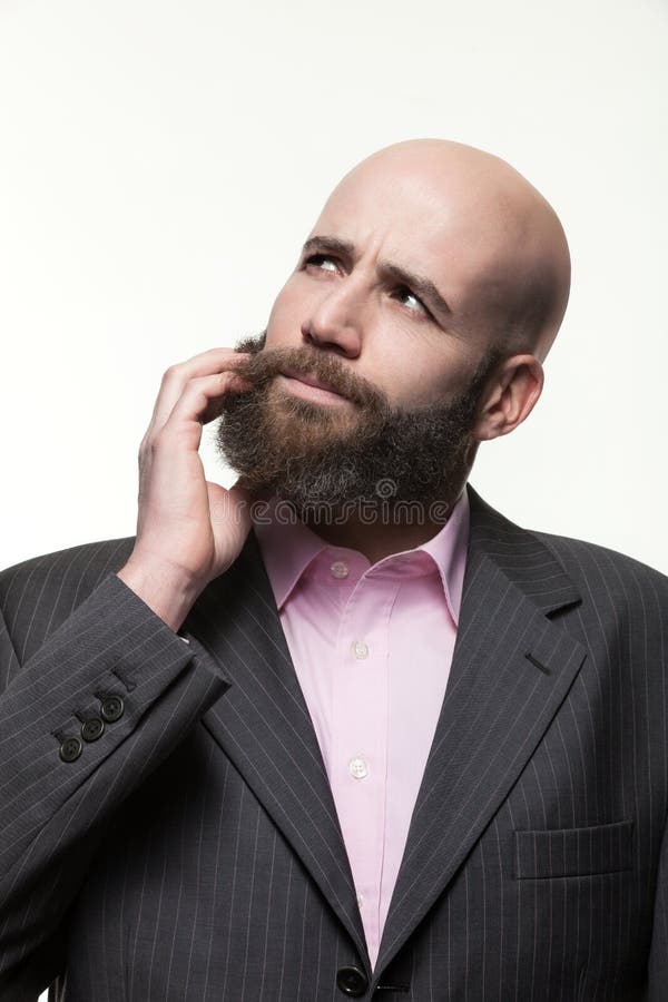 Young bald man with a beard royalty free stock image