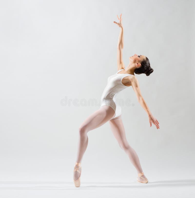 Young ballerina on grey version