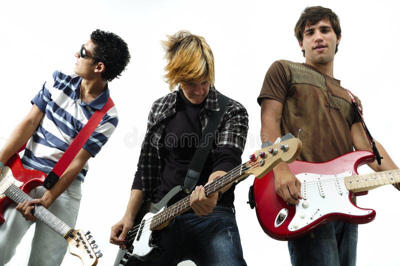 Young band posing with instrument, isolated