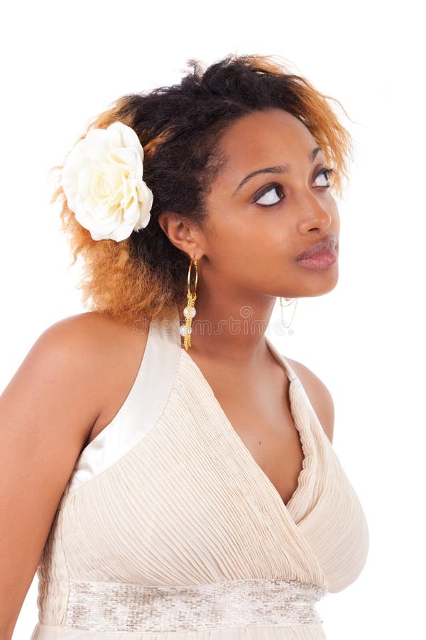 Young beautiful african american woman looking up