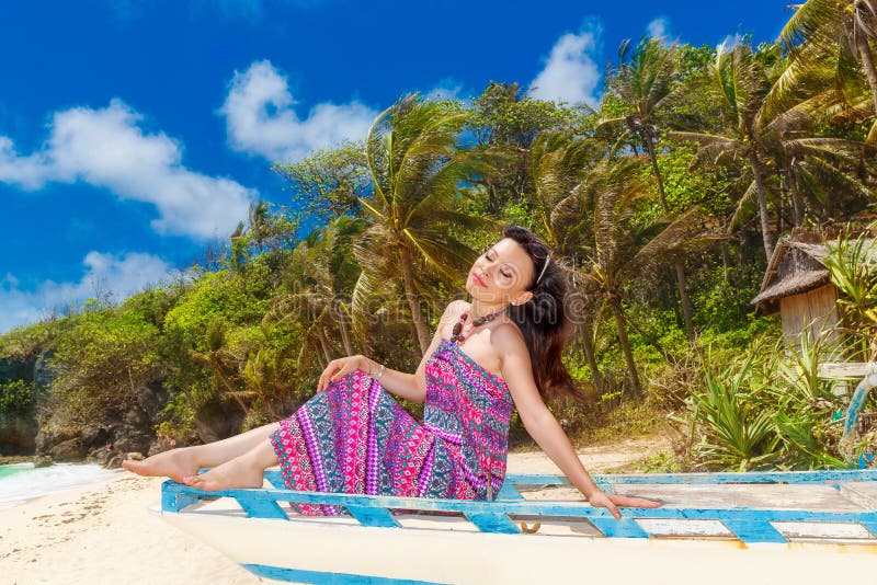 Young Beautiful Asian Girl in Blue Dress on the Beach of a Trop Stock ...
