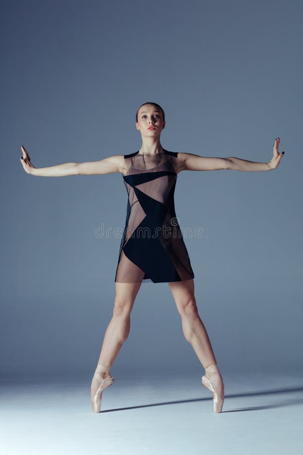 Young beautiful ballerina is posing in studio royalty free stock photos Young beautiful ballerina is posing in studio royalty free stock photos