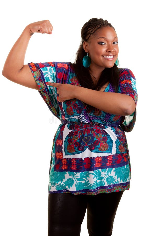 Young beautiful african american woman showing her muscle, isolated on white background. Young beautiful african american woman showing her muscle, isolated on white background