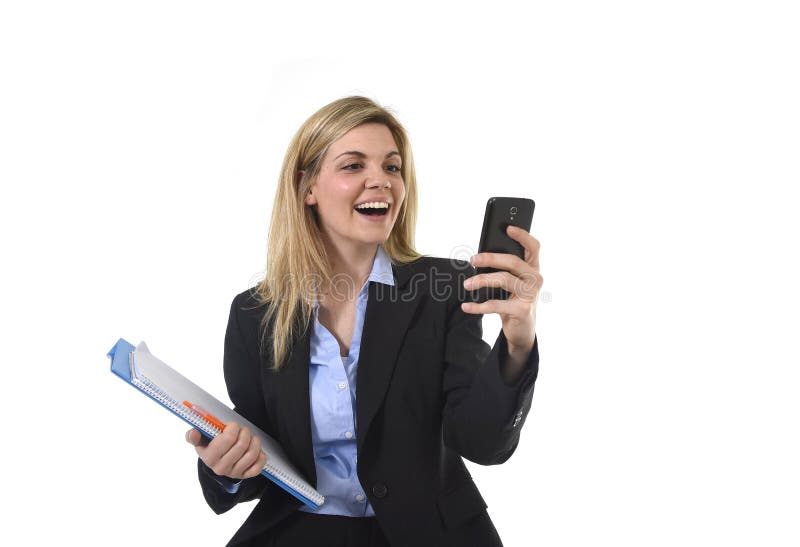 Young beautiful blond hair businesswoman using internet app on mobile phone holding office folder and pen smiling happy