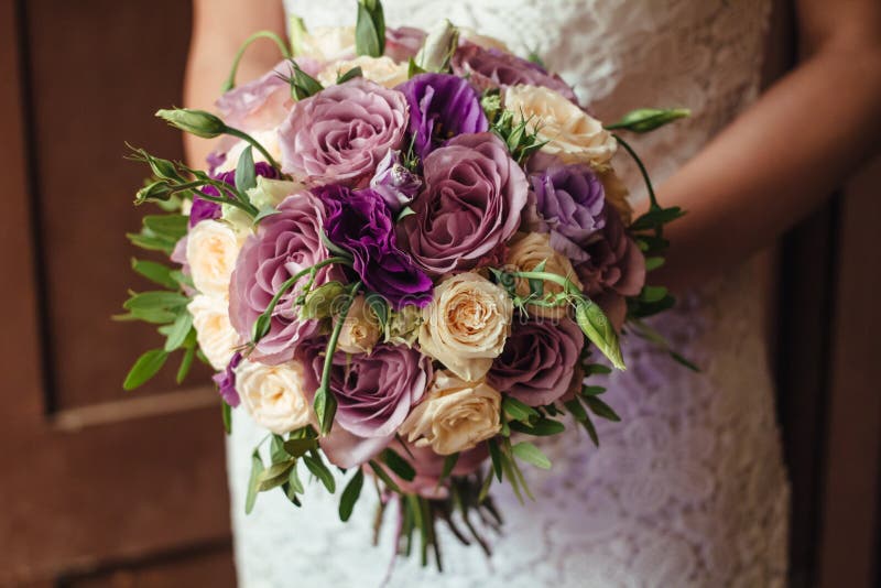 Young Beautiful Bride In White Dress Holding Wedding Bouquet, Bouquet Of  Bride From Rose Cream Spray, Rose Bush, Rose Purple Memor Stock Image -  Image Of Gifts, Freesia: 126751735