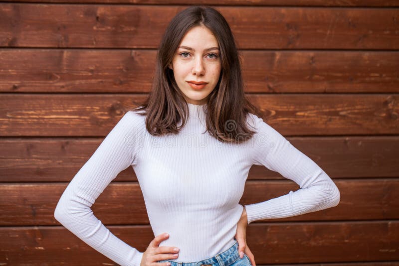 Young Beautiful Brown Haired Girl With Freckles On Her Face Stock Image