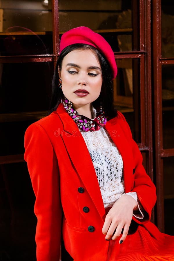 Beautiful Brunette Girl in a Red Suit, White Shirt and Red Beret Stock ...