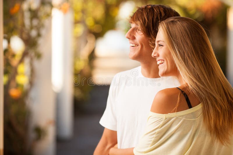 Young beautiful couple enjoying a day on the park