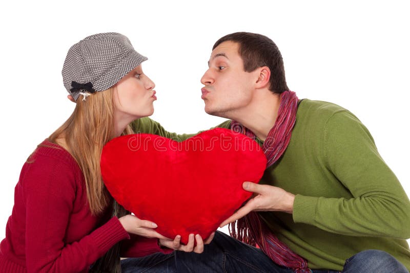 Young beautiful couple with red heart