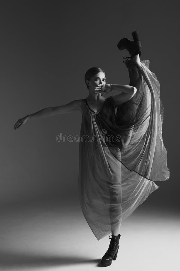 Young beautiful dancer is posing in studio royalty free stock photos Young beautiful dancer is posing in studio royalty free stock photos