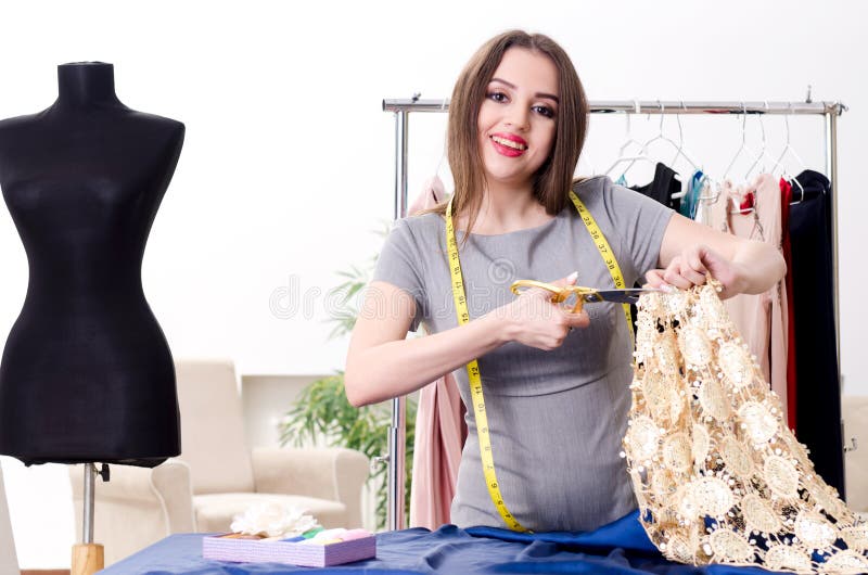 The Young Beautiful Female Tailor Taking Measurements Stock Image ...