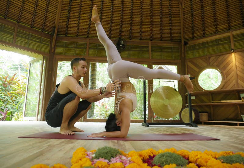 Acrobatic yoga in a gym stock image. Image of space, acrobatic - 57205871