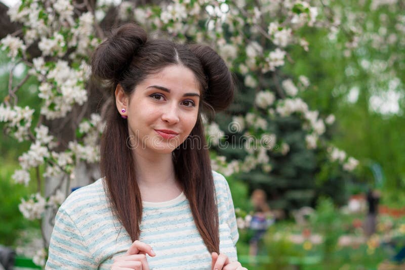 Young beautiful funny girl. A woman with a beautiful smile and a flirty look. A young brunette girl with beautiful eyes and pretty stock images Young beautiful funny girl. A woman with a beautiful smile and a flirty look. A young brunette girl with beautiful eyes and pretty stock images