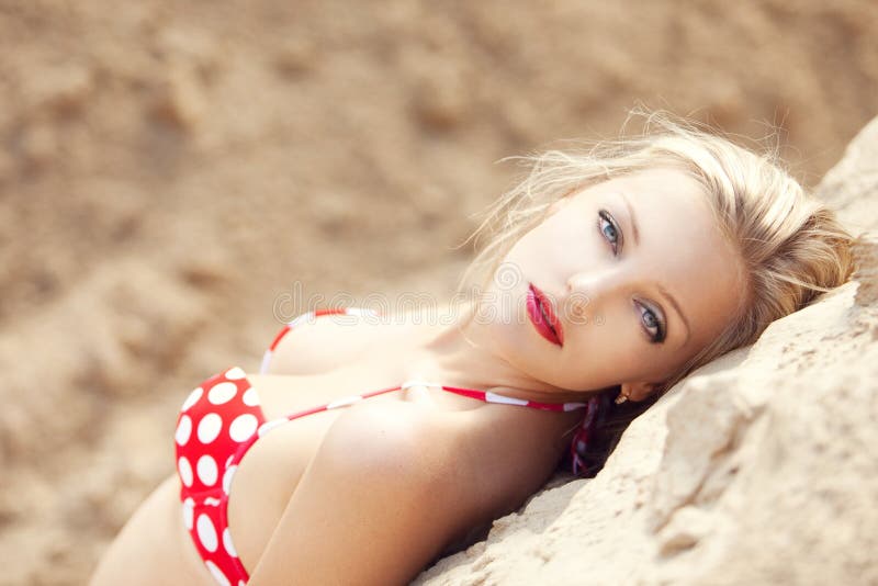 Young beautiful girl in a bathing suit