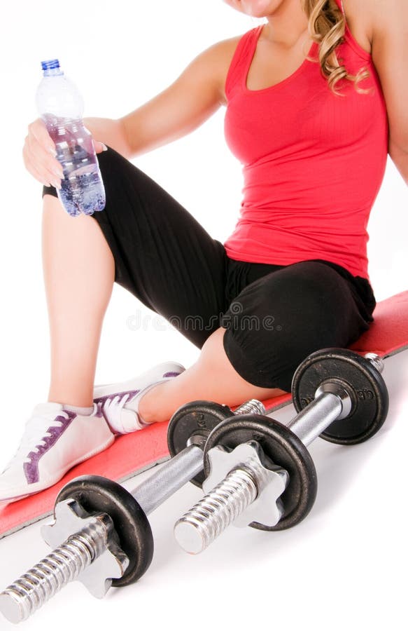 Young beautiful girl at the gym