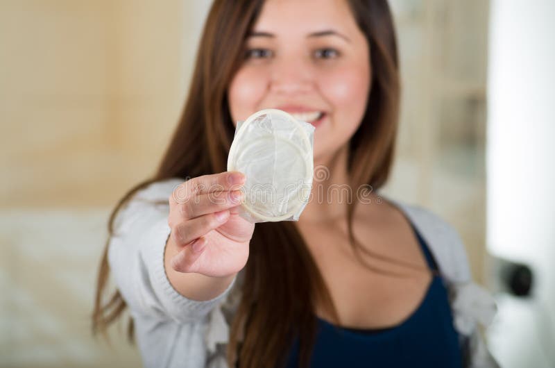 Young Beautiful Girl Holding An Open Female Condom Safe Sex Concept Protection Against Aids 