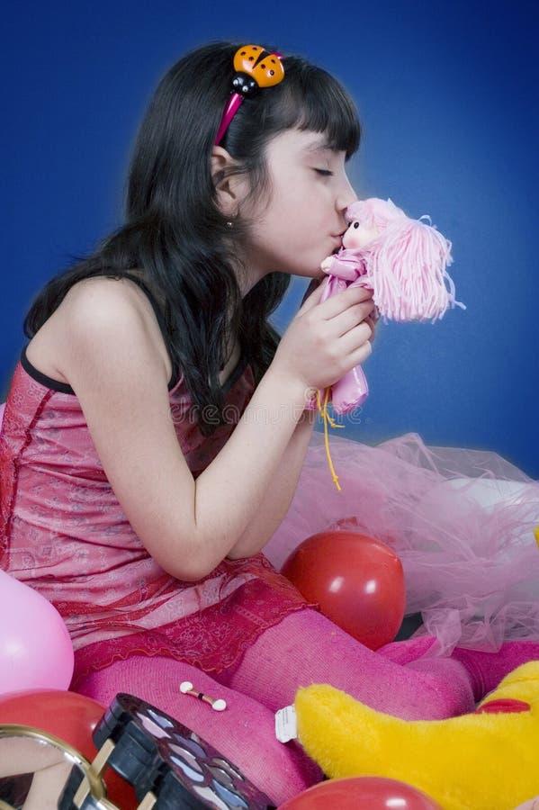 Young and Beautiful Girl Kissing Her Doll Stock Image Image of