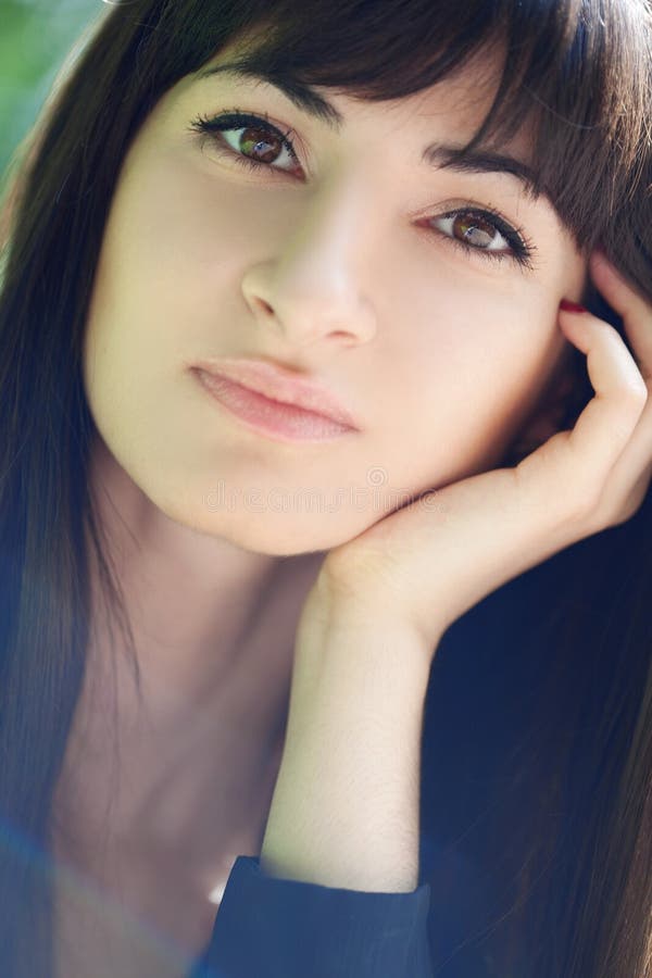 Young beautiful girl with long black hair