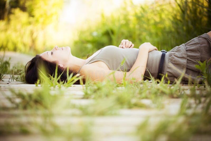 Lying on a walkway