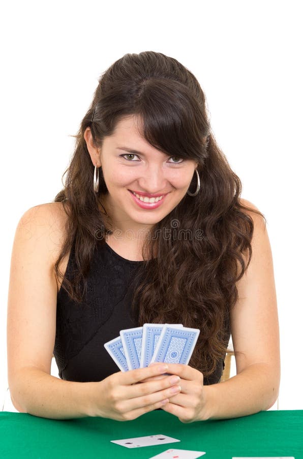 Young beautiful girl playing cards