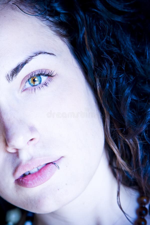 Young beautiful green eyed woman