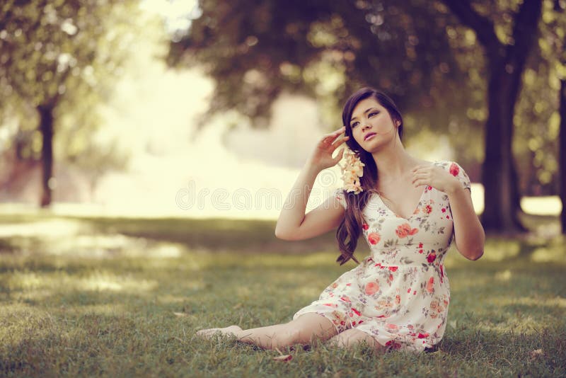 Young beautiful japanese woman with flowers