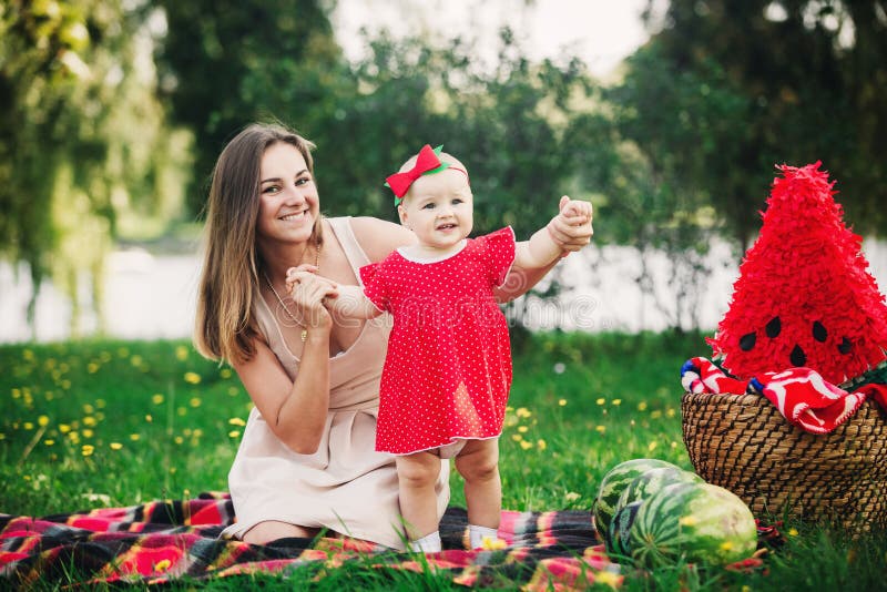 Young Beautiful Mother and Baby Daughter on Picnic on Nature on Summer Day Vacation. Mom and Girl Playing in the Field Stock Image - Image of people, mother: 237352149 Young Beautiful Mother and Baby Daughter on Picnic on Nature on Summer Day Vacation. Mom and Girl Playing in the Field Stock Image - Image of people, mother: 237352149