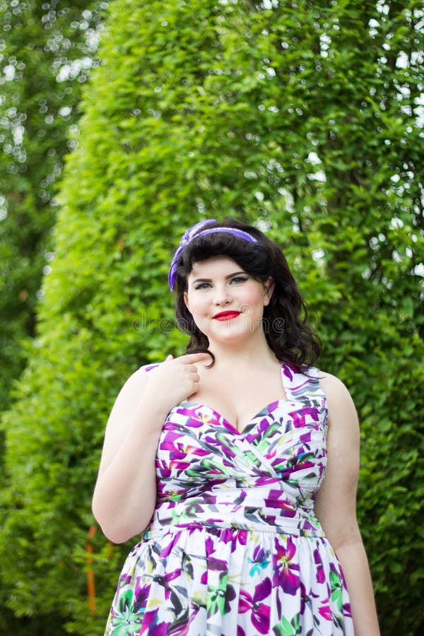 Young Beautiful Plus Size Girl among the Plants. Stock Photo - Image of  makeup, hairstyle: 107330956