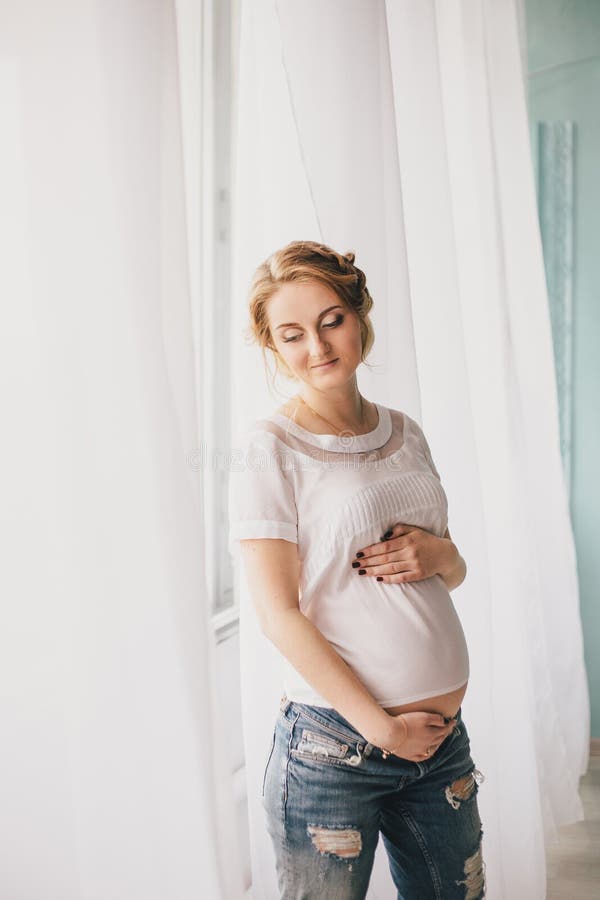 Young beautiful pregnant woman in vintage interior stock photography Young beautiful pregnant woman in vintage interior stock photography