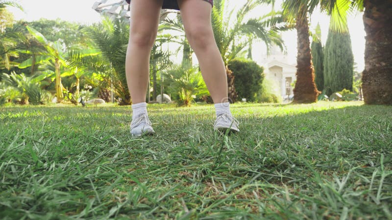 Young Beautiful Red-haired Girl Dancing in the Park. Woman in a Mini Skirt Dancing in a Tropical Park on a Background of Stock Video - Video of dancer, heaven: 125087761 