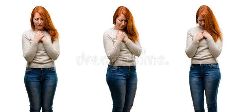 Young beautiful redhead woman isolated over white background