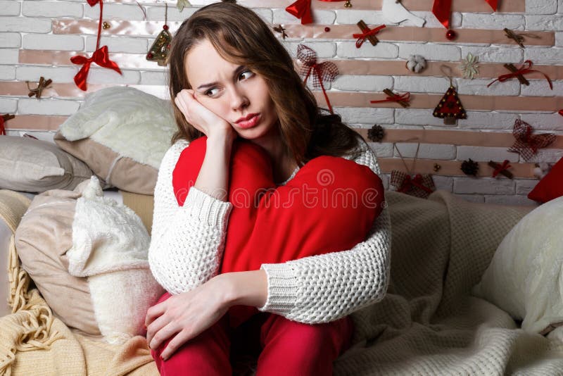 Young beautiful sad brunette girl