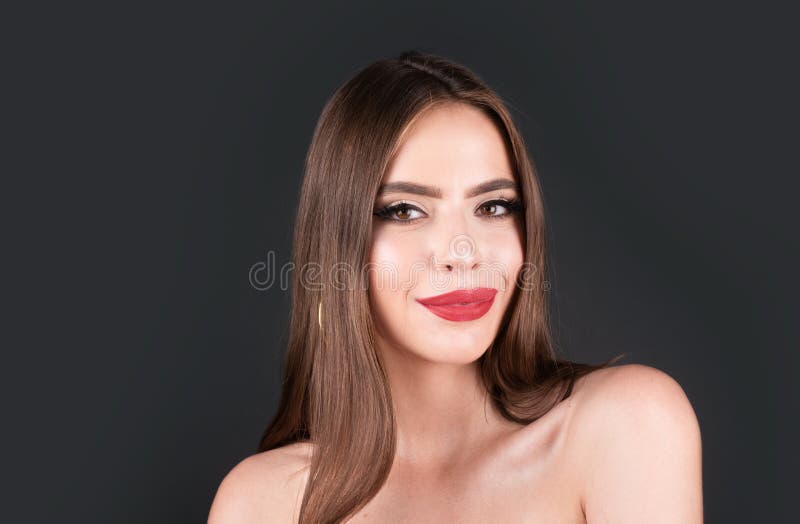 Young beautiful sensual woman. Woman with sexy lips. Fashion beauty portrait on studio background. Clean skin and bright