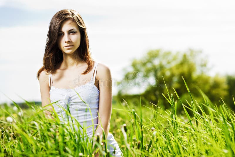 Young beautiful woman on the nature