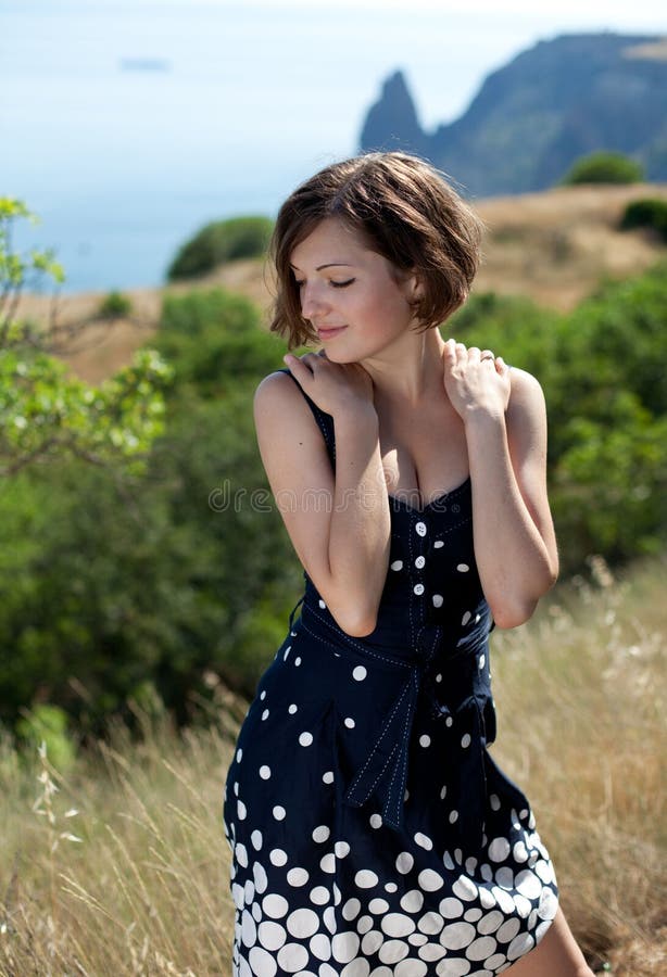 Young beautiful smiling woman outdoors