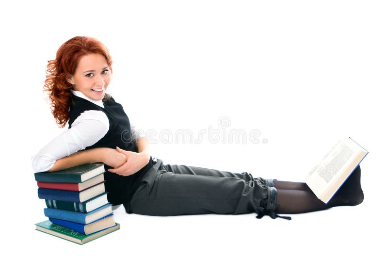 Young beautiful student girl with books