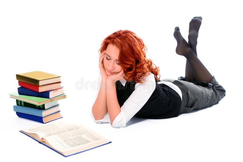 Young beautiful student girl read book