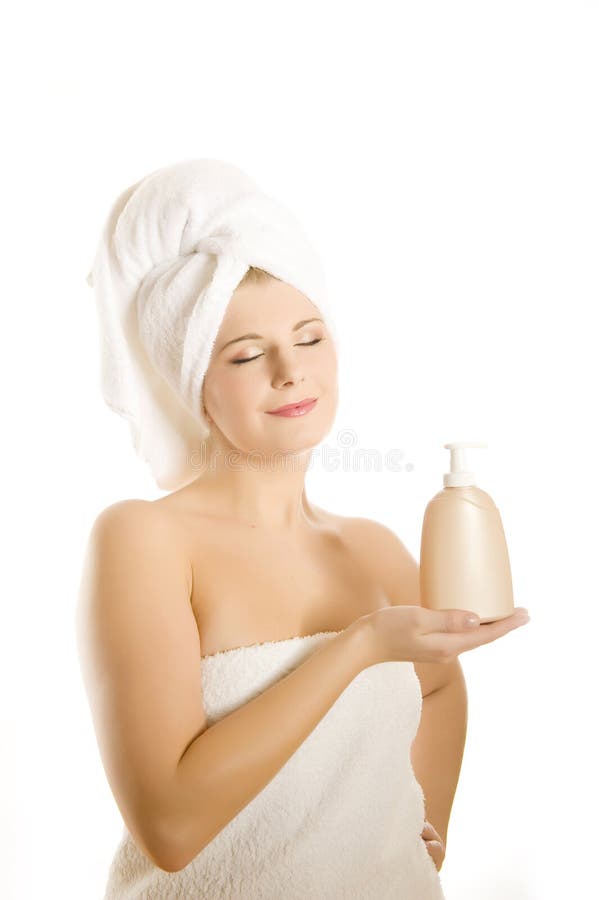 Young beautiful woman with body lotion