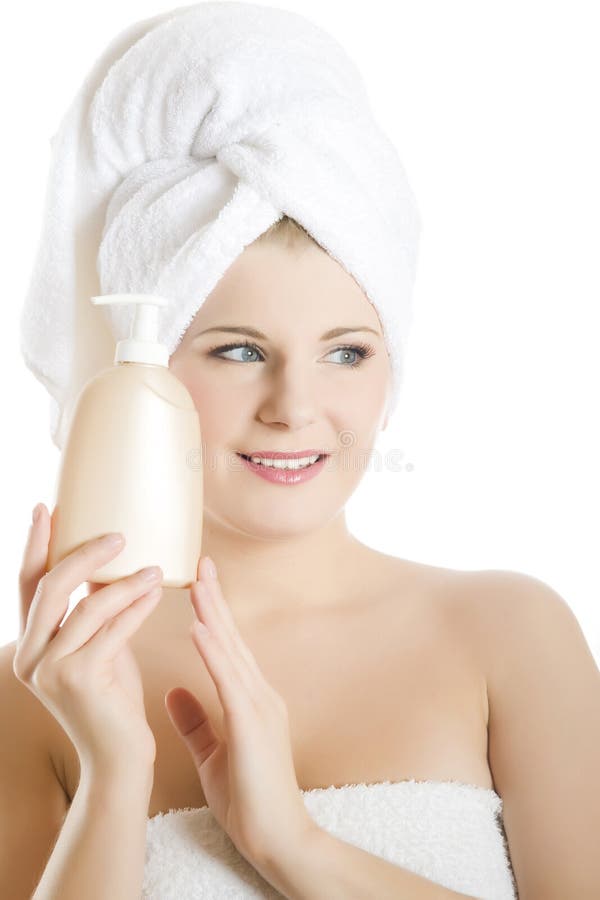 Young beautiful woman with body lotion