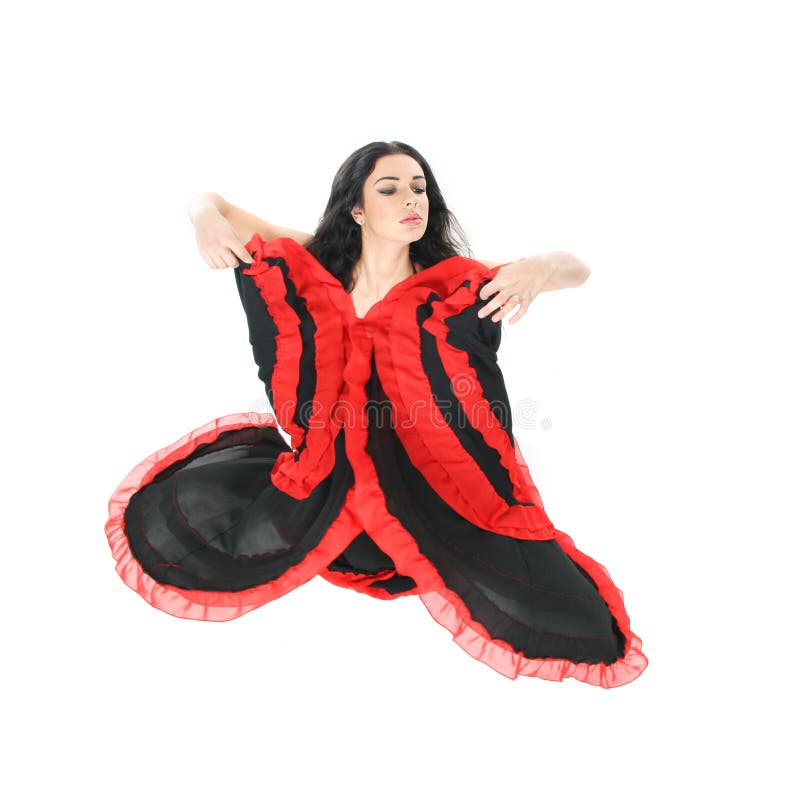 Young beautiful woman dancing flamenco over w