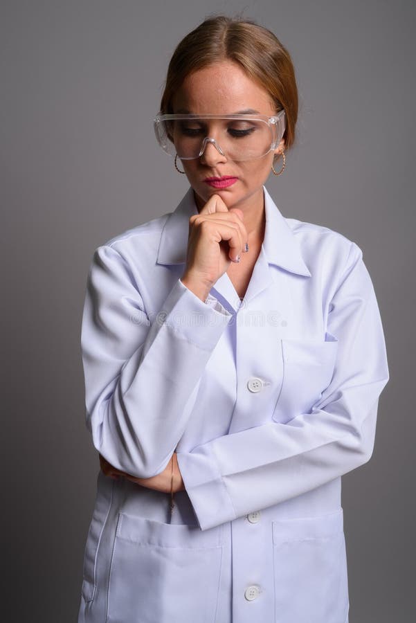 Young Beautiful Woman Doctor With Blond Hair Wearing Protective Stock