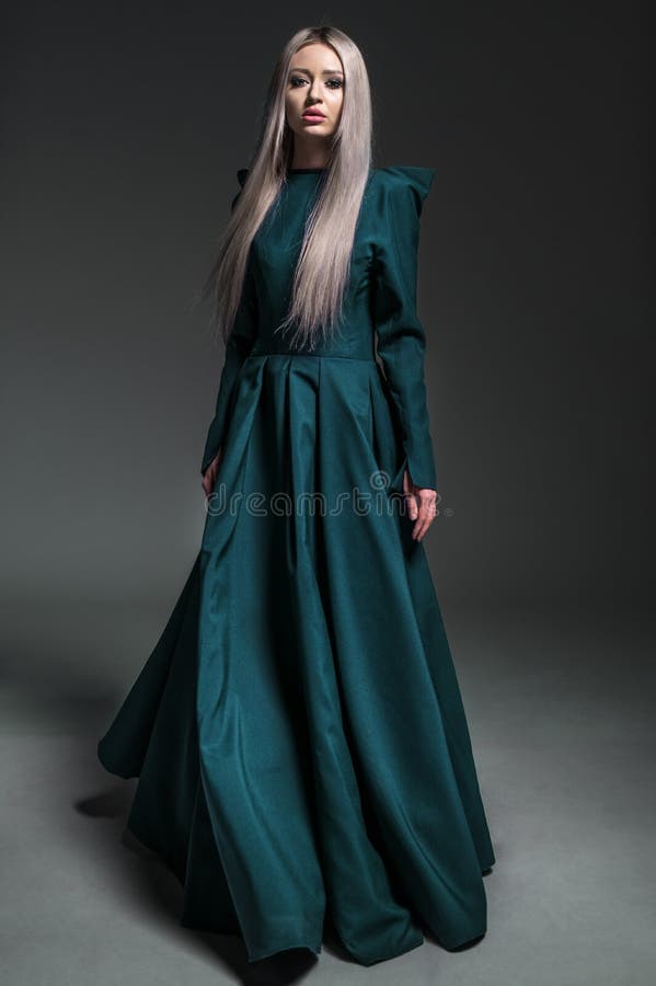 Young beautiful woman in dress royalty free stock images Young beautiful woman in dress royalty free stock images