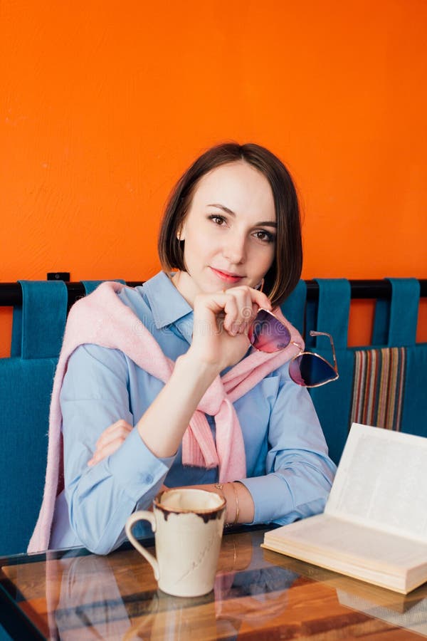 Woman Drinking Coffee And Reading A Book In A Cafe Stock Image Image Of Book Female 116906997