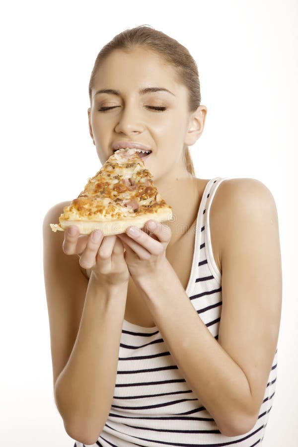 Young beautiful woman eat pizza