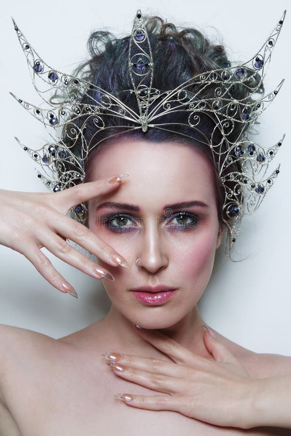 Young Beautiful Woman with Fancy Makeup and Crown on Her Head Stock Image -  Image of coloration, attractive: 179642757