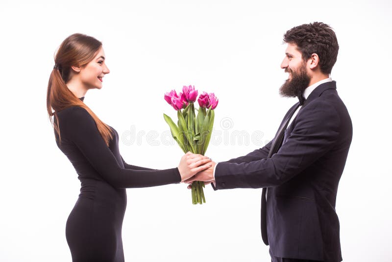 Young beautiful woman get flower bucket from his boyfriend stock photography Young beautiful woman get flower bucket from his boyfriend stock photography