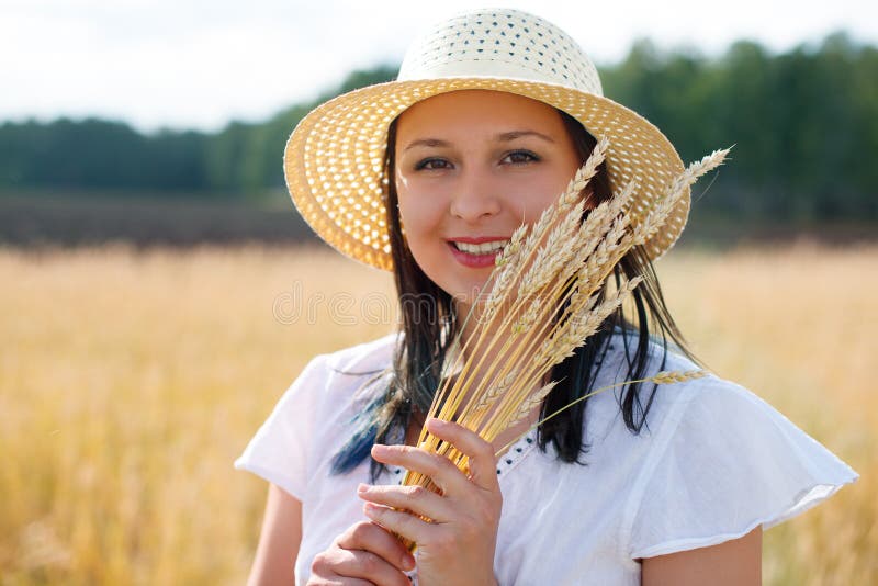 Young Beautiful Woman in Golden Wheat Field. Concept of Summer, Freedom ...