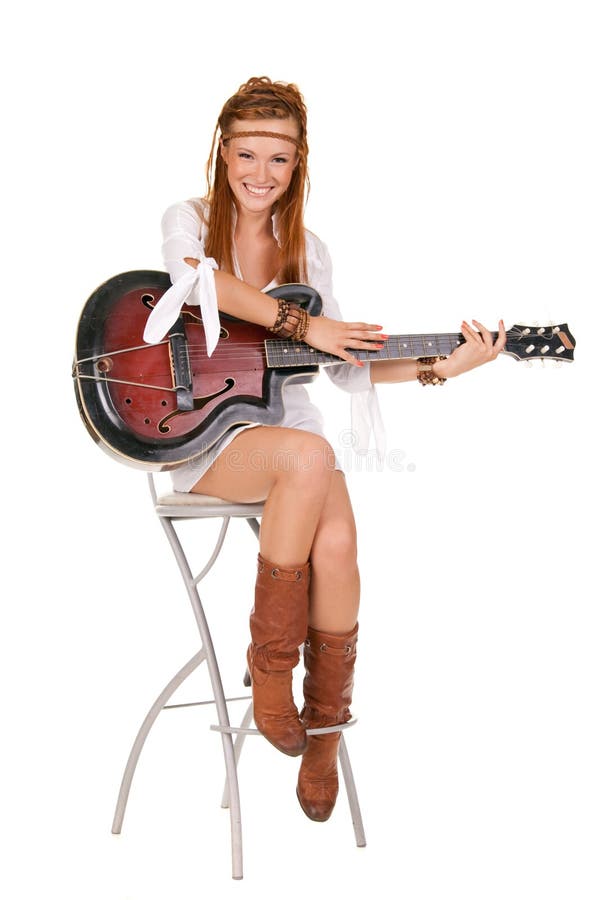 Young beautiful woman with guitar